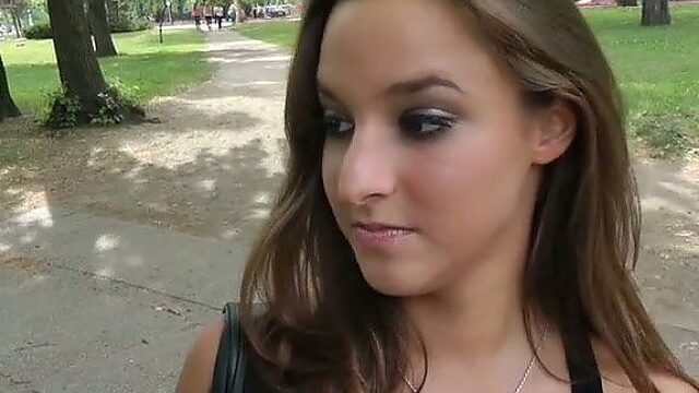 Alluring brunette girl gives awesome blowjob in public park