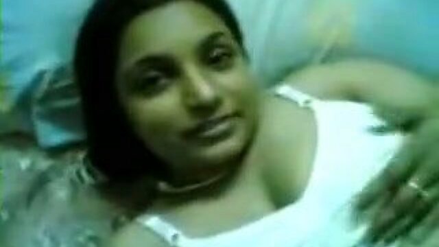 Fat Indian whore with nasty body masturbates on the bed