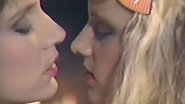 Busty retro lesbians swtich from talking to eating each other's pussies