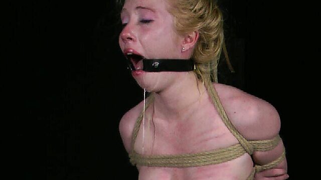 Tied up slut with small tits is punished with nipples clamps
