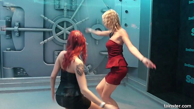Two hot blooded bitches is dancing under the shower in the club