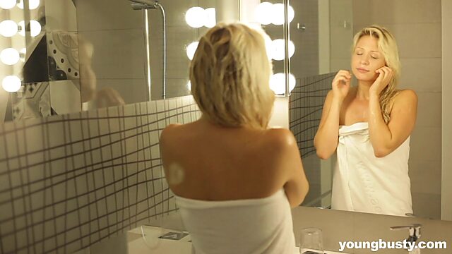 Sexy blonde Gabi Gold is playing with herself in the shower