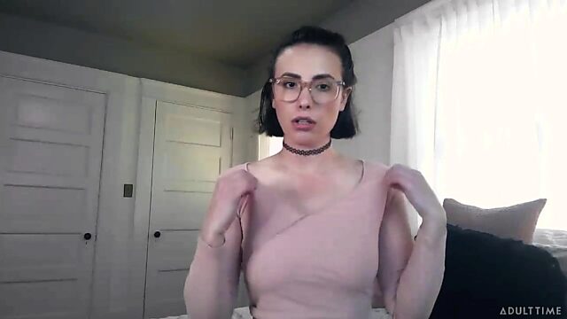 Brunette in glasses Casey Calvert gets naked in front of web camera
