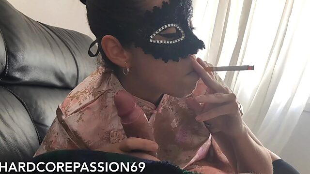 Asian mistress blowing cigarette & cock, rides dick, takes creampie.