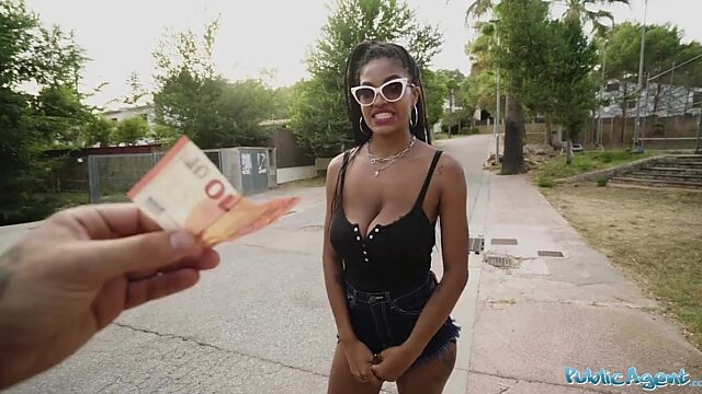Black slut is ready to give a look at her big tits and fuck for money on the street
