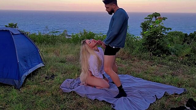 Risky couple enjoys sex on the sunset while camping