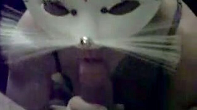 House wife in funny mask sucks cock