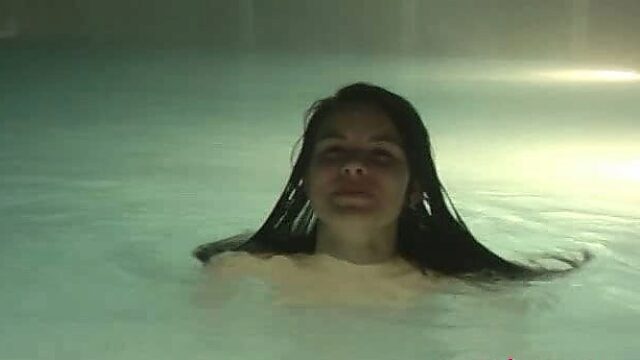 Zuzinka wanks in a pool until she cums and flatters with joy in the water